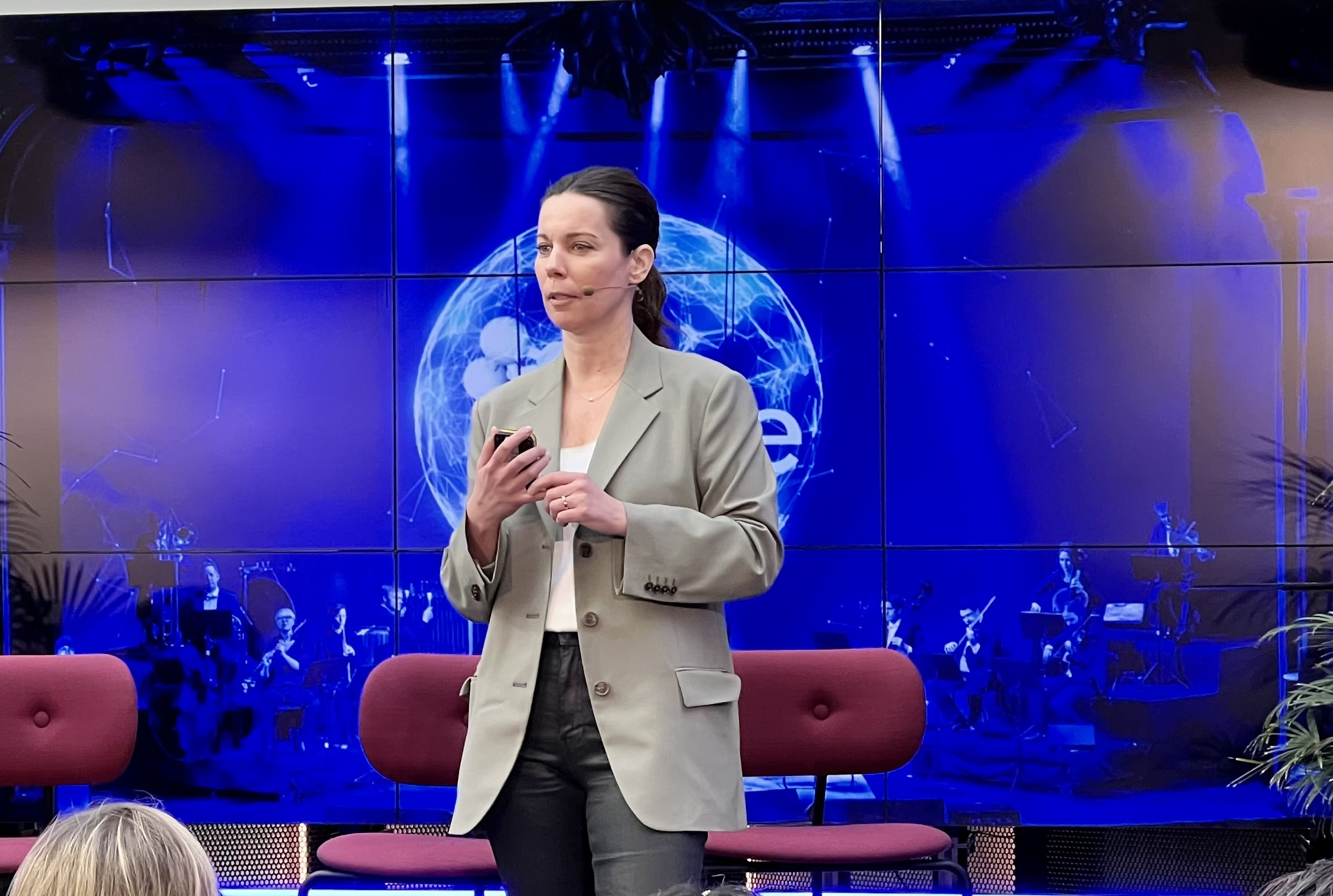 Linda Wakeham, Chief Marketing & Communications Officer at Mavatar on stage speaking